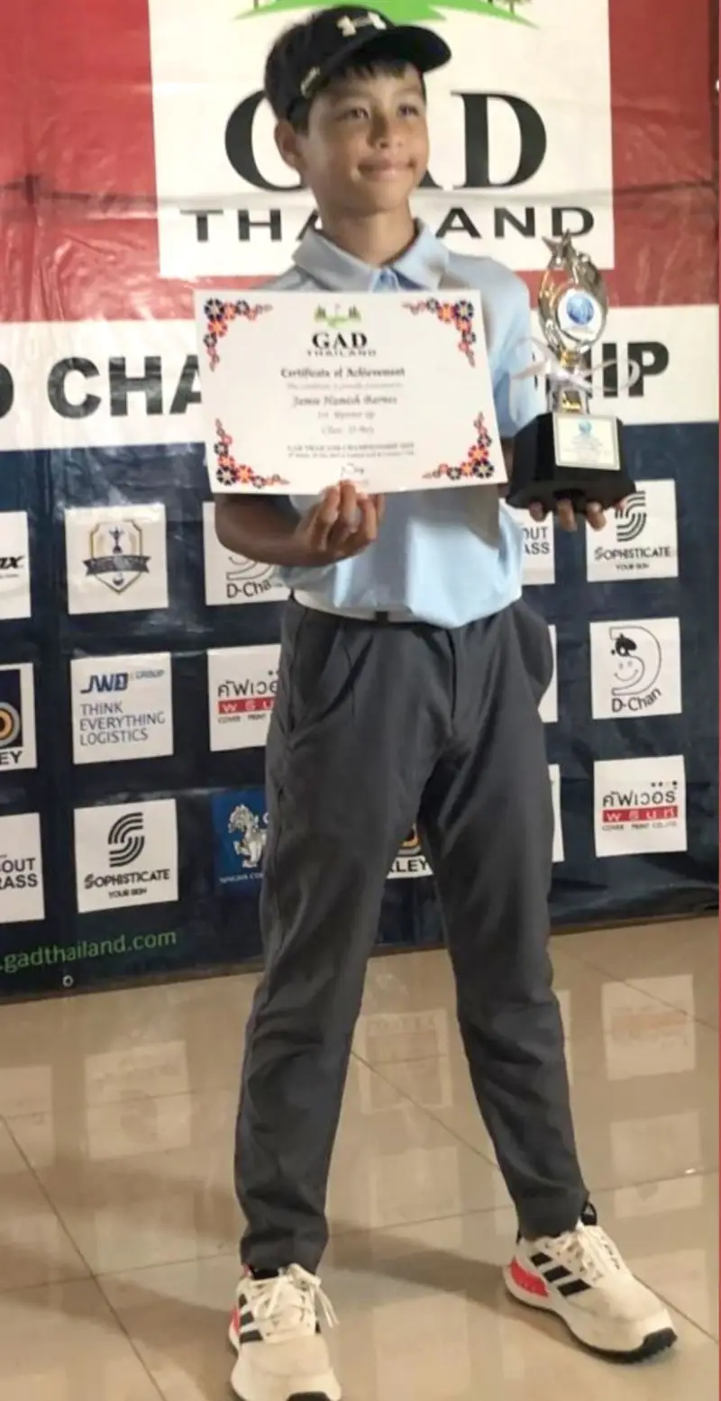 Jamie Hamish Barnes with junior golf trophies, 2024–2025